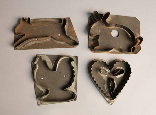 Appraisal: Four tinned sheet iron cookie cutters rabbit - h w