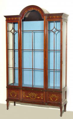 Appraisal: AN EDWARDIAN MAHOGANY DISPLAY CABINET of mildly breakfront oblong form