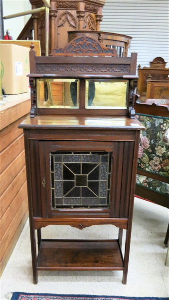 Appraisal: A VICTORIAN WALNUT MUSIC CABINET English last quarter of the