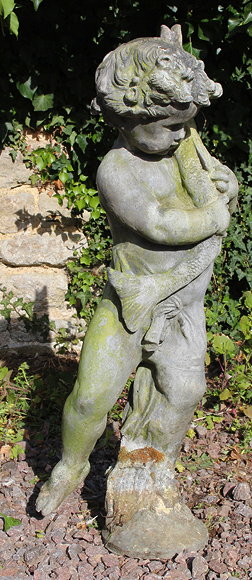 Appraisal: AN OLD LEAD FOUNTAIN IN THE FORM OF A BOY