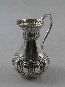 Appraisal: A Victorian silver cream jug Lias Brothers London cm high