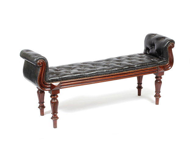 Appraisal: A WILLIAM IV MAHOGANY WINDOW SEAT with scroll ends black