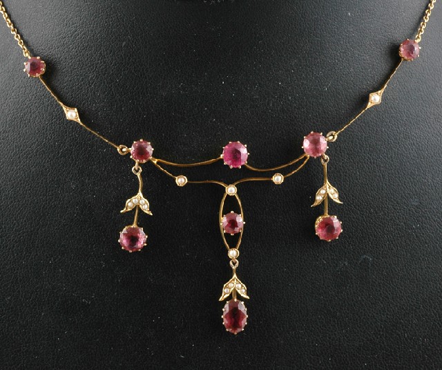 Appraisal: AN EDWARDIAN PINK TOURMALINE AND SEED PEARL NECKLACE The ct