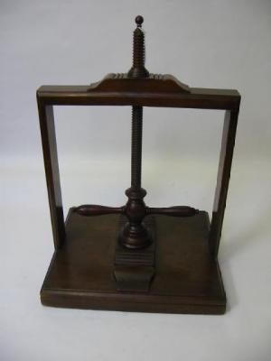 Appraisal: A MAHOGANY TABLE TOP BOOK PRESS th century of oblong