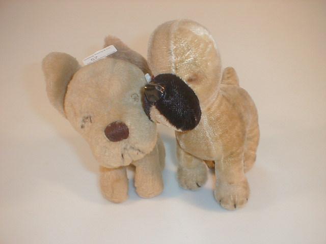 Appraisal: A Merrythought plush dog high together with another minus ears