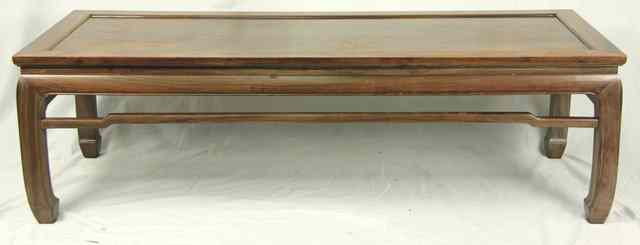 Appraisal: A Chinese hardwood rectangular coffee table the top with recessed