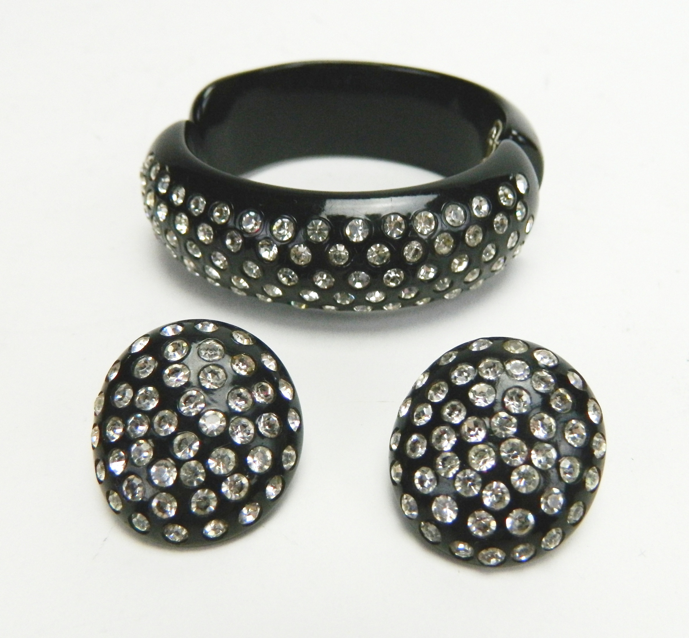 Appraisal: Vintage black and clear rhinestone clamper bangle bracelet and matching