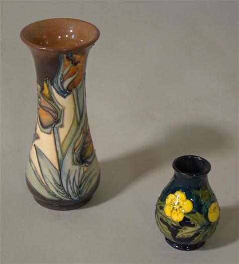 Appraisal: TWO MOORCROFT VASES Impressed marks the largest with colorful tulips