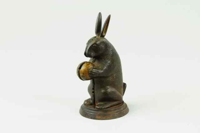 Appraisal: RABBIT STANDING MECHANICAL BANK Small size Bronze painted Japanned base