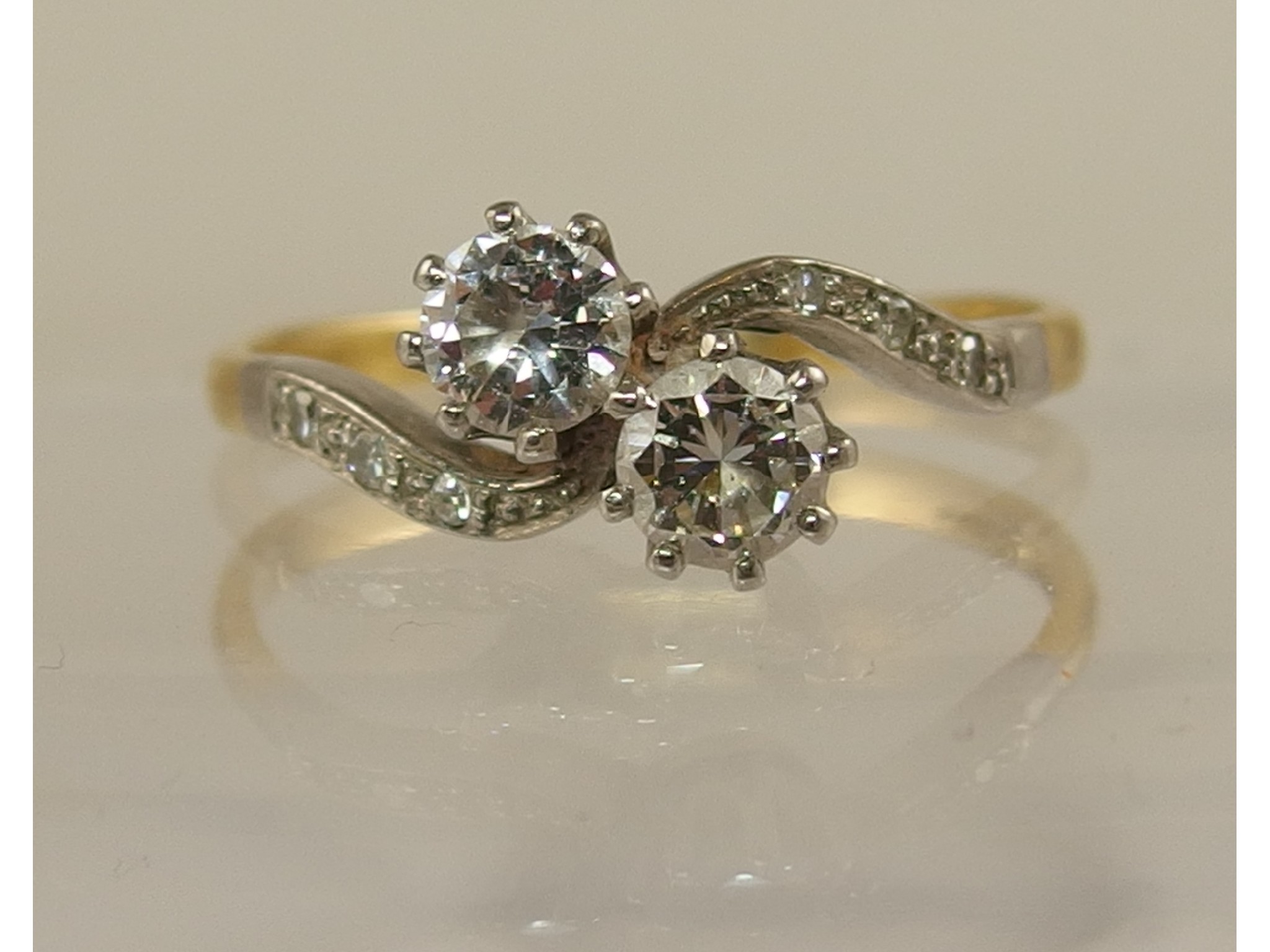 Appraisal: An ct gold and platinum twin stone diamond ring of