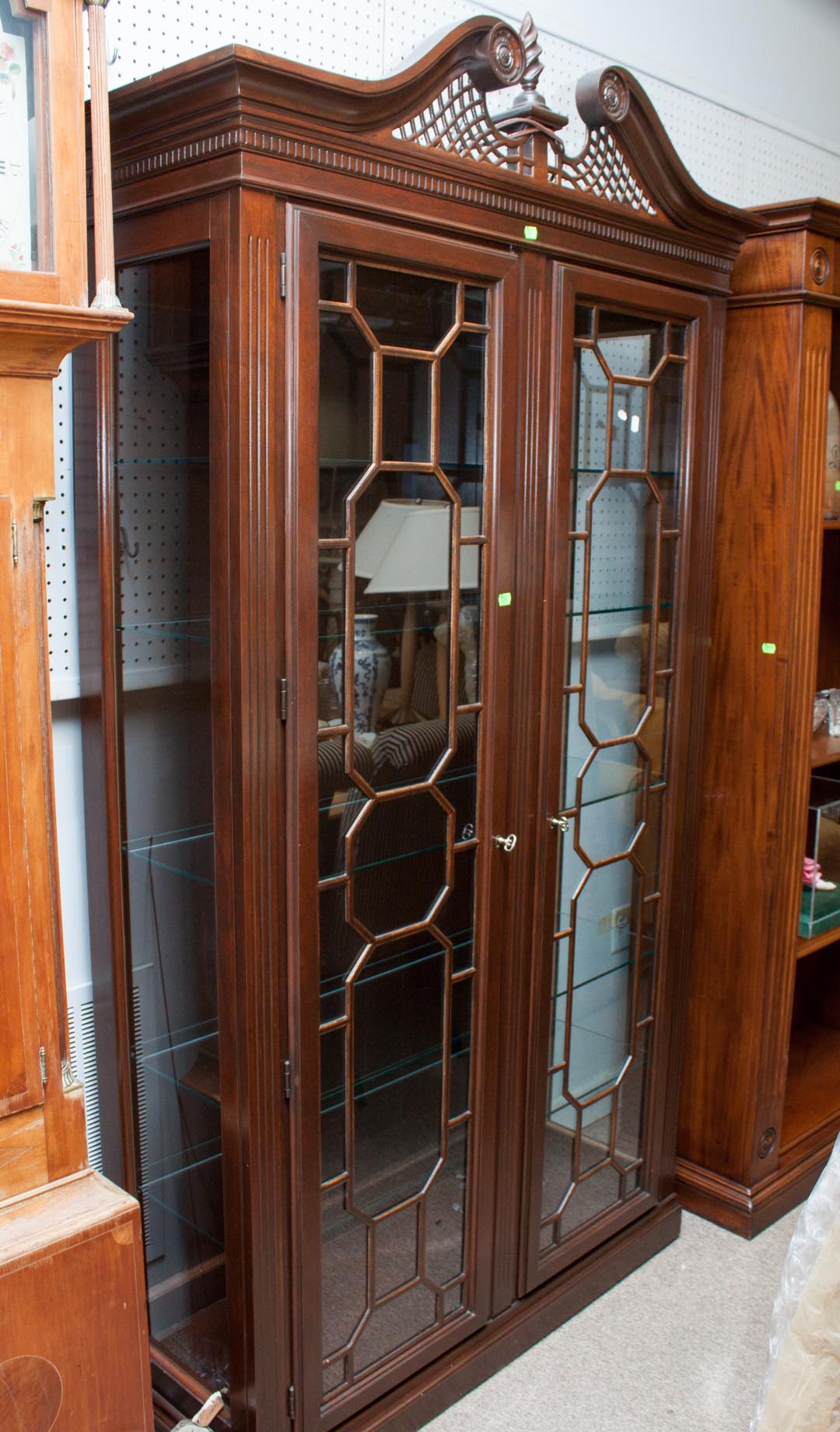 Appraisal: Chippendale style mahogany display cabinet