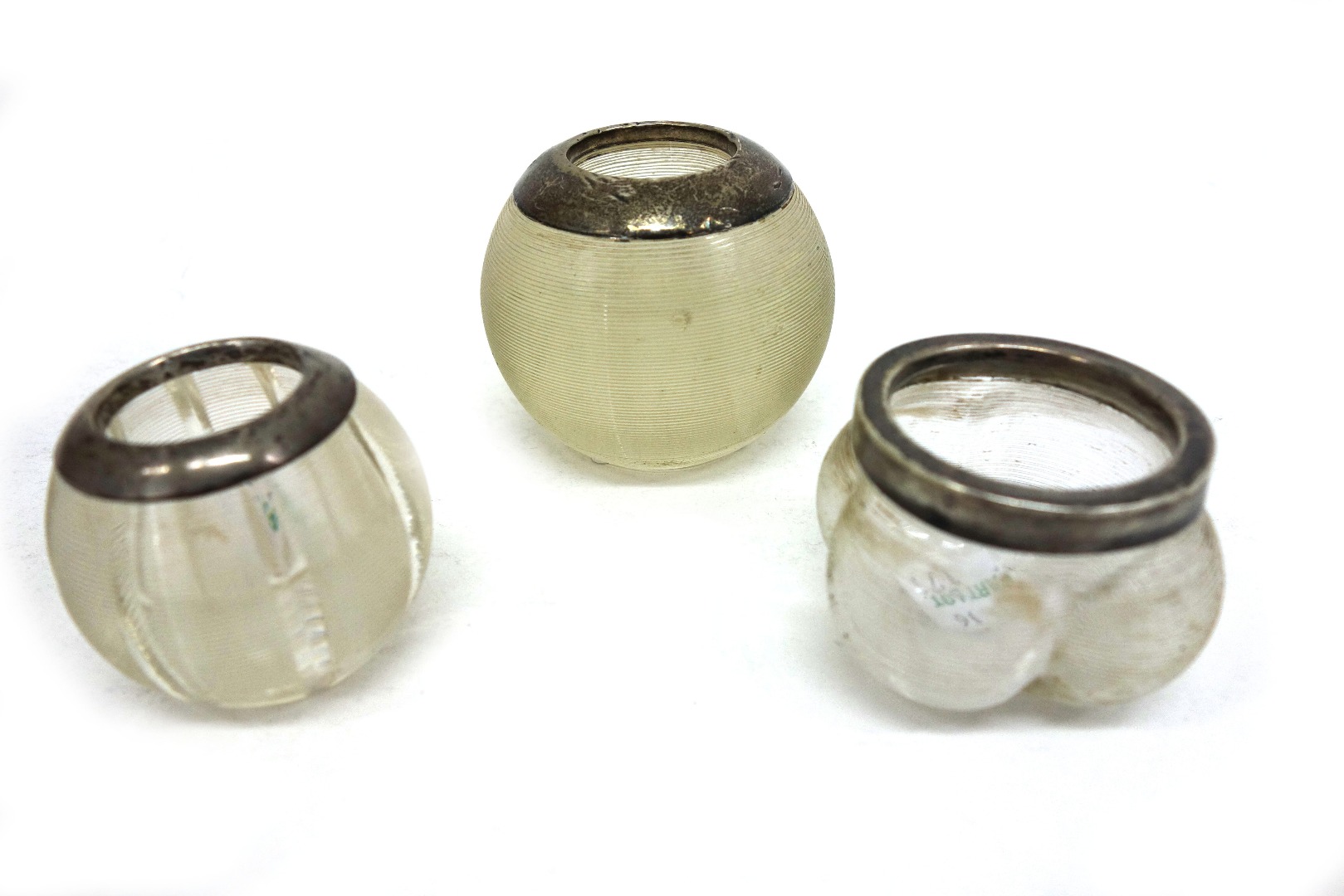 Appraisal: Three late Victorian silver mounted glass match holders strikers varying