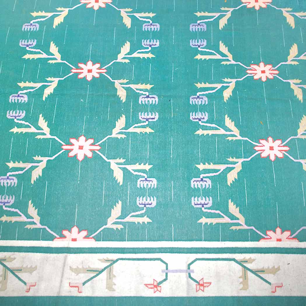 Appraisal: Dhurrie Carpet India Contemporary The allover pattern of rosettes amongst