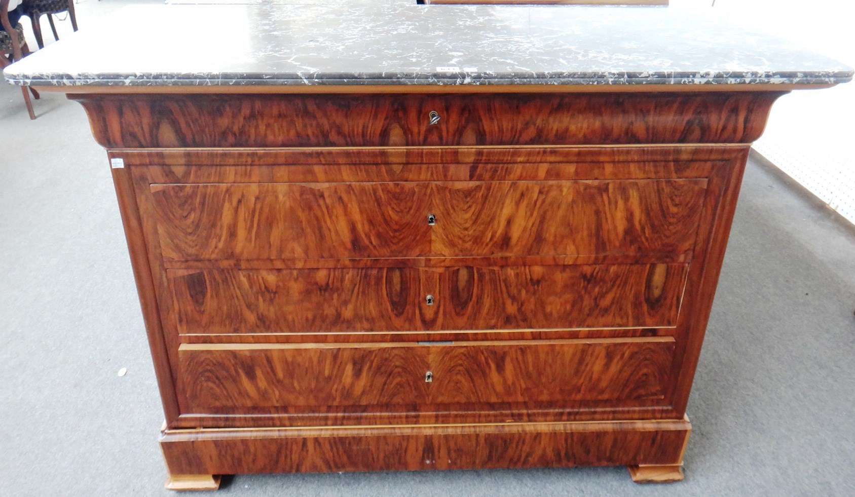 Appraisal: A th century marble top commode with a figured walnut