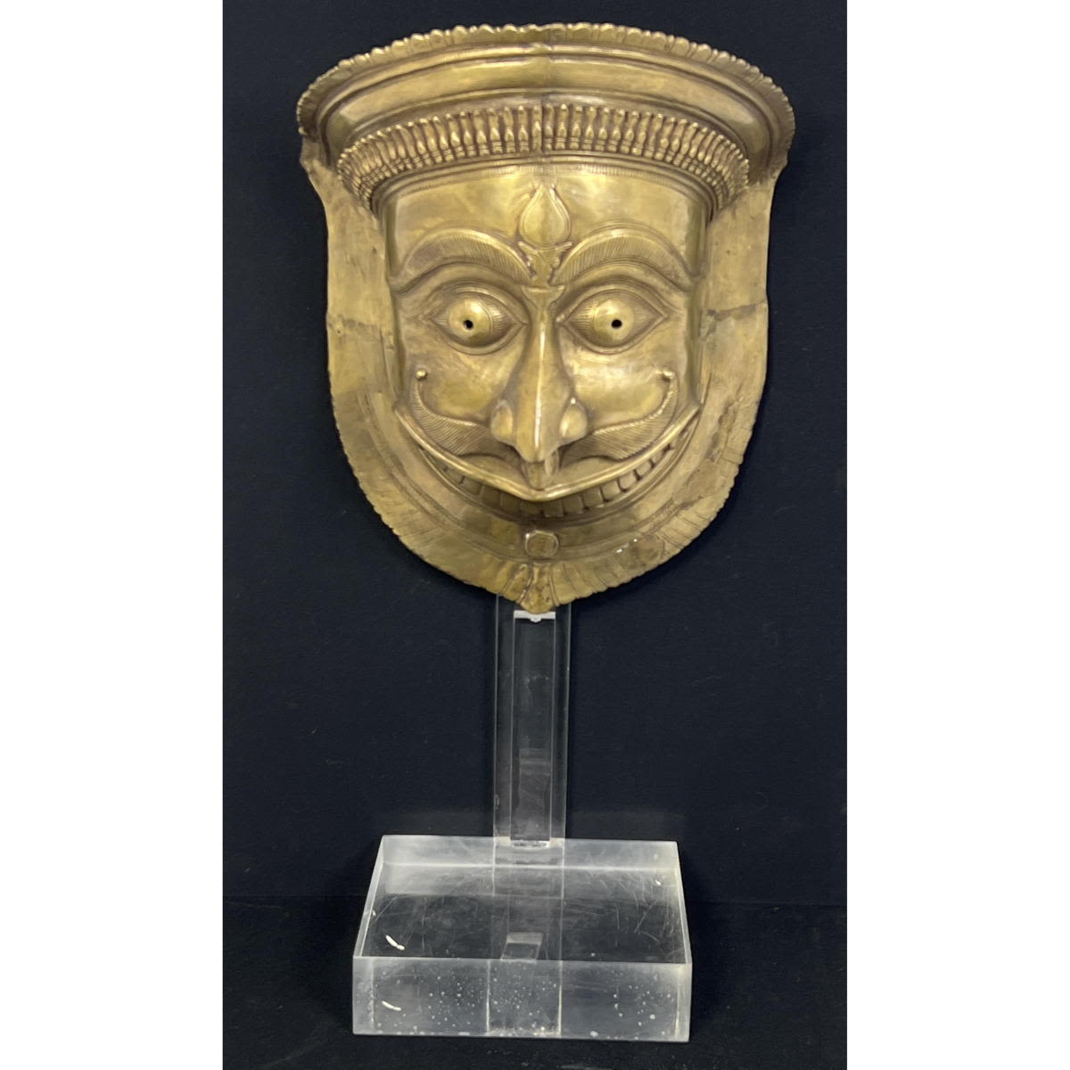 Appraisal: Antique Gilt Metal Tibetan Tribal Mask Mounted on Lucite Base