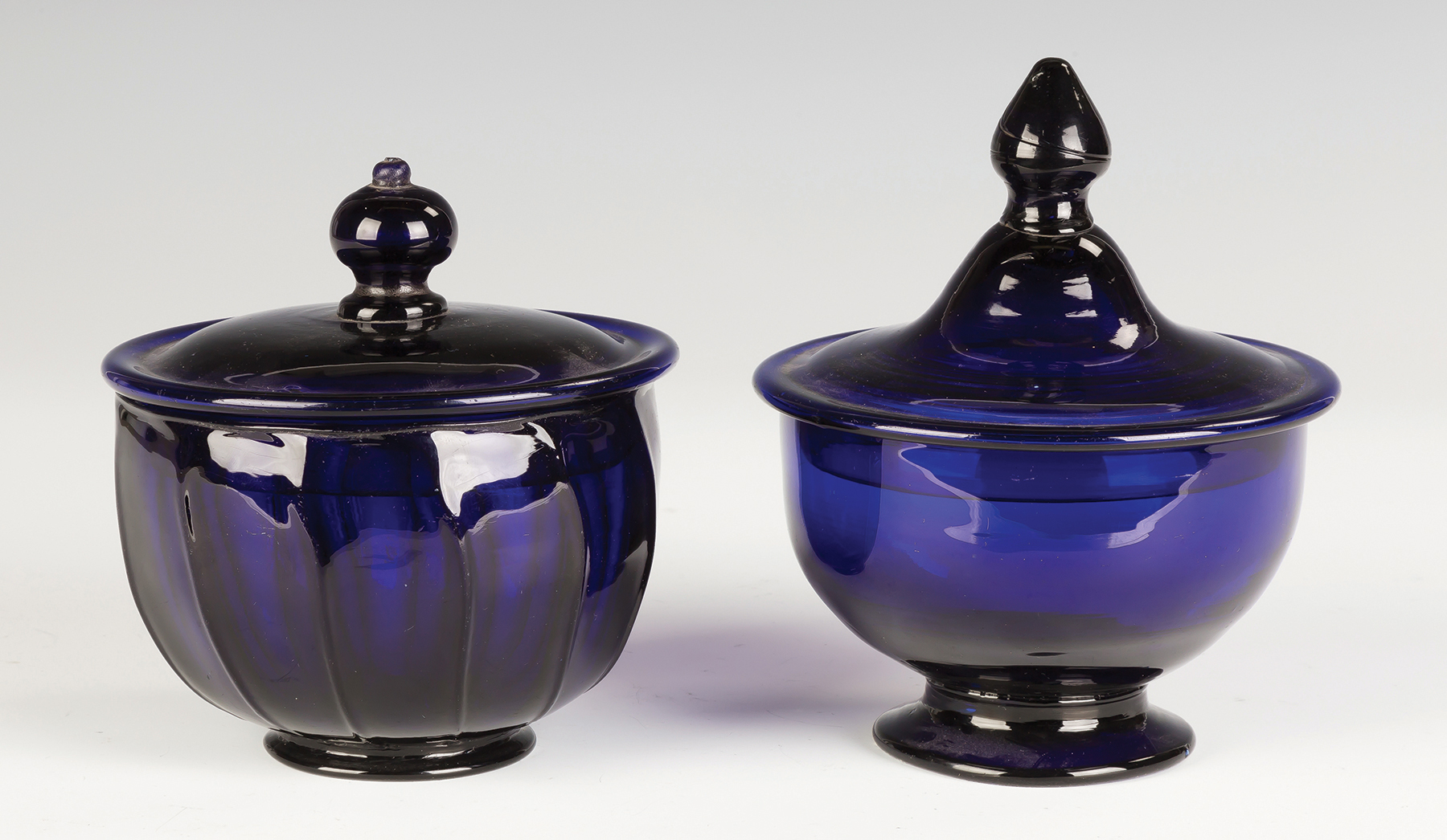 Appraisal: Two Cobalt Blue Covered Sugar Bowls th century