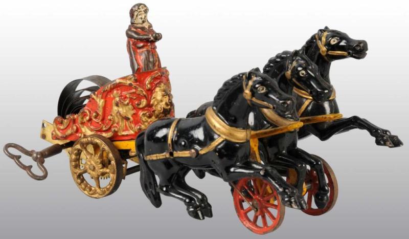 Appraisal: Cast Iron Hubley Roman Chariot Clockwork Toy Description Working Very