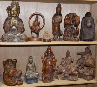 Appraisal: Chinese Sculptures Guanyin Budai lot of Two shelves of various