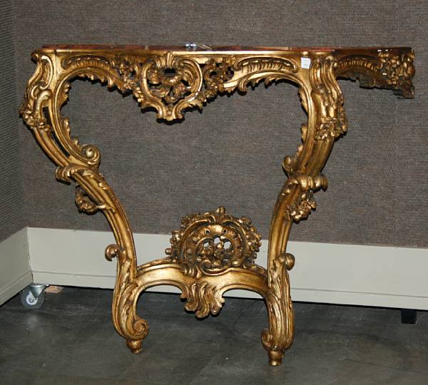 Appraisal: A Louis XV style carved and giltwood serpentine console second