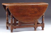 Appraisal: EARLY WALNUT GATE-LEG DINING TABLE Oval top with six legs