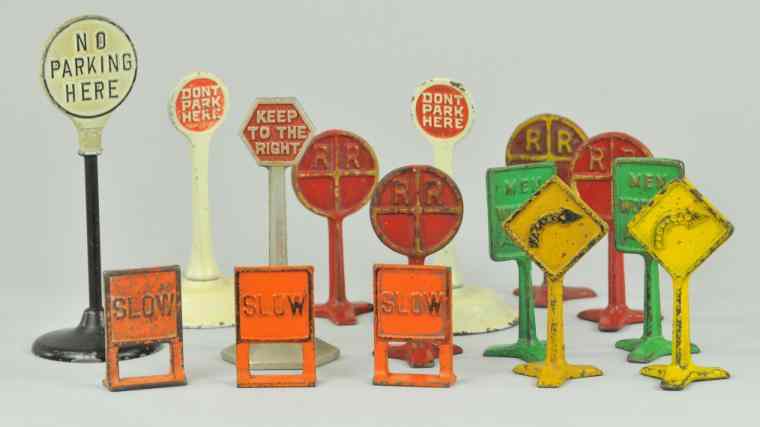 Appraisal: ASSORTED CAST IRON ROAD SIGNS Various warnings and varied colors