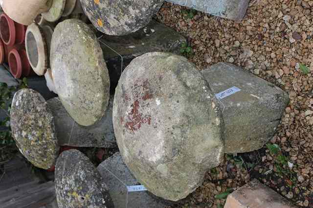 Appraisal: A PAIR OF OLD LIMESTONE STADDLESTONES with circular broad tops