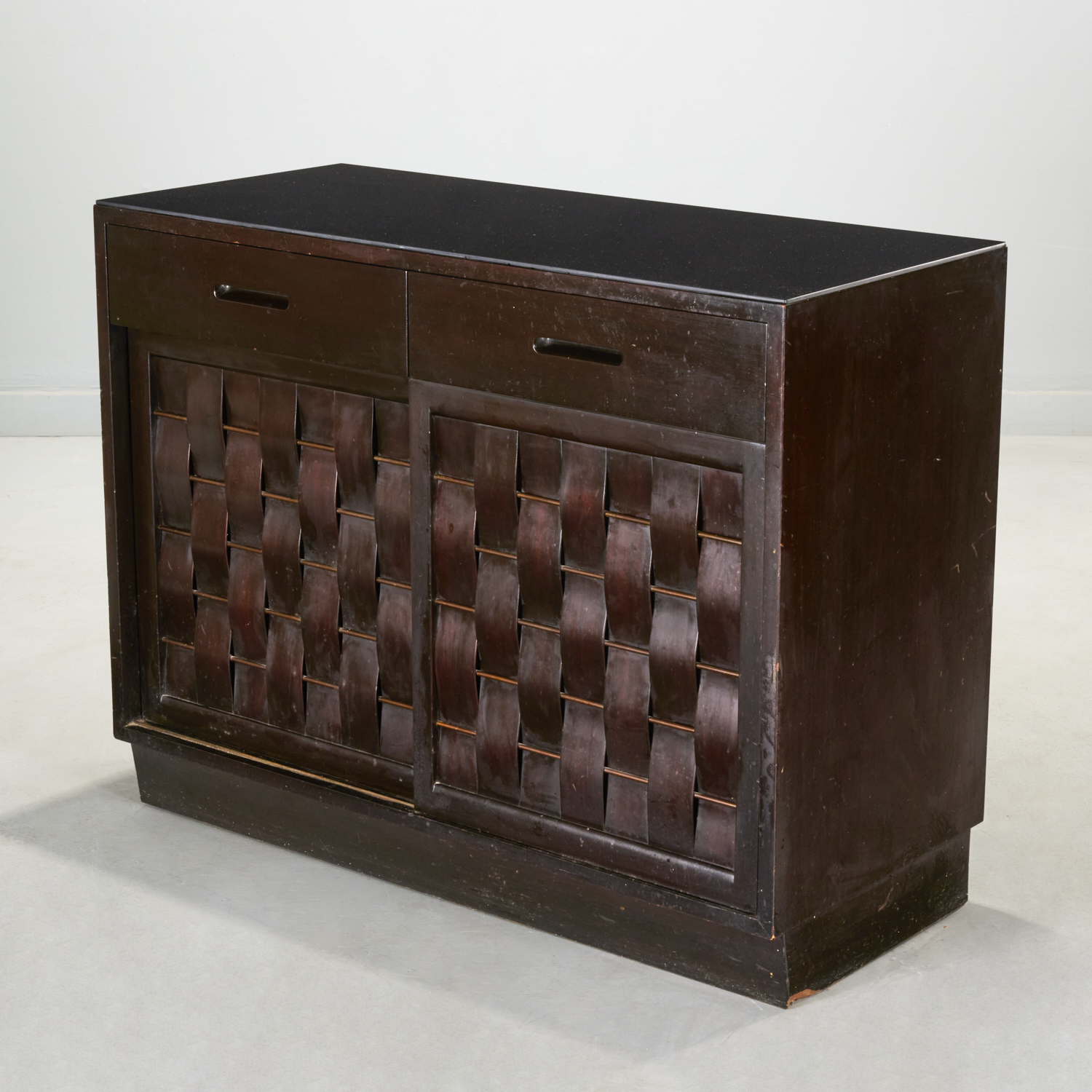 Appraisal: EDWARD WORMLEY FOR DUNBAR WOVEN-FRONT CABINET c American dark stained