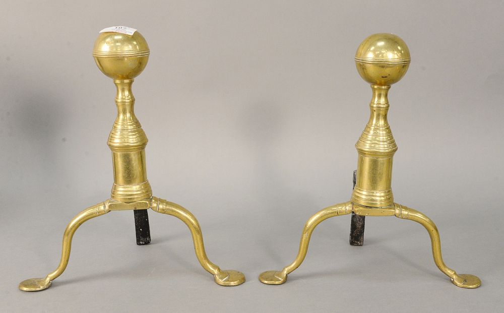 Appraisal: Pair of brass penny foot andirons each with ball finial