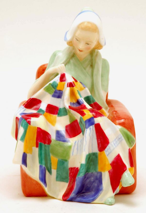 Appraisal: A Royal Doulton figure entitled The Patchwork Quilt Marked on