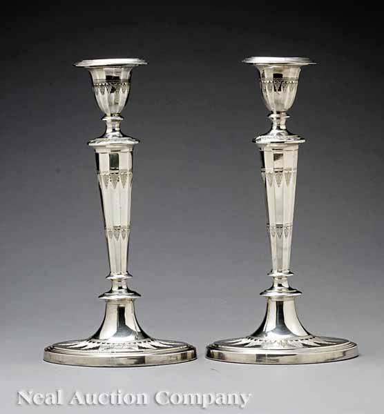 Appraisal: A Pair of English Silverplate Candlesticks in the Neoclassical Taste