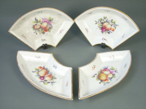 Appraisal: A four piece English porcelain oval hors d'oeuvres' set th