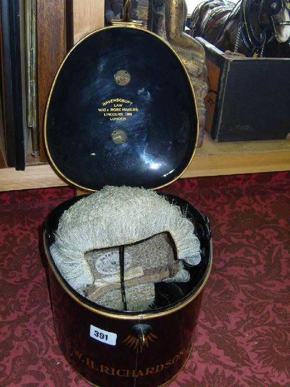 Appraisal: A black tin wig box with gilt banded decoration and