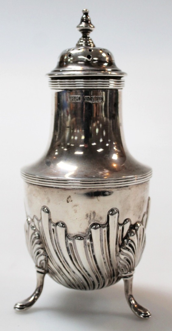 Appraisal: A Victorian silver sugar caster by Harrison Brothers the squat