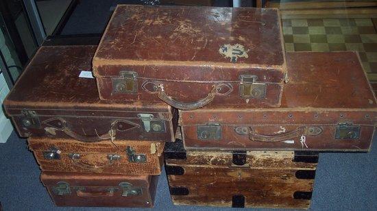 Appraisal: Five leather suitcases various sizes and a metal bound pine