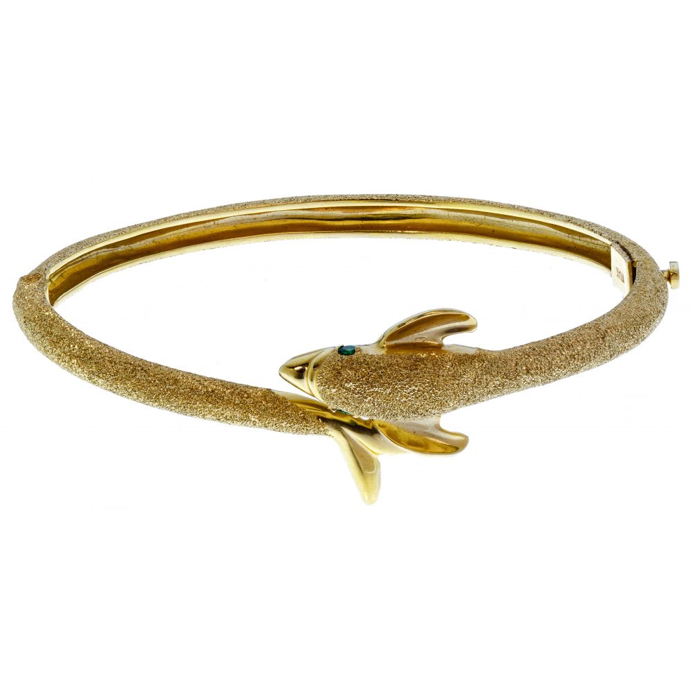 Appraisal: K YELLOW GOLD DOLPHIN HINGED BANGLE BRACELETHaving a brushed finish