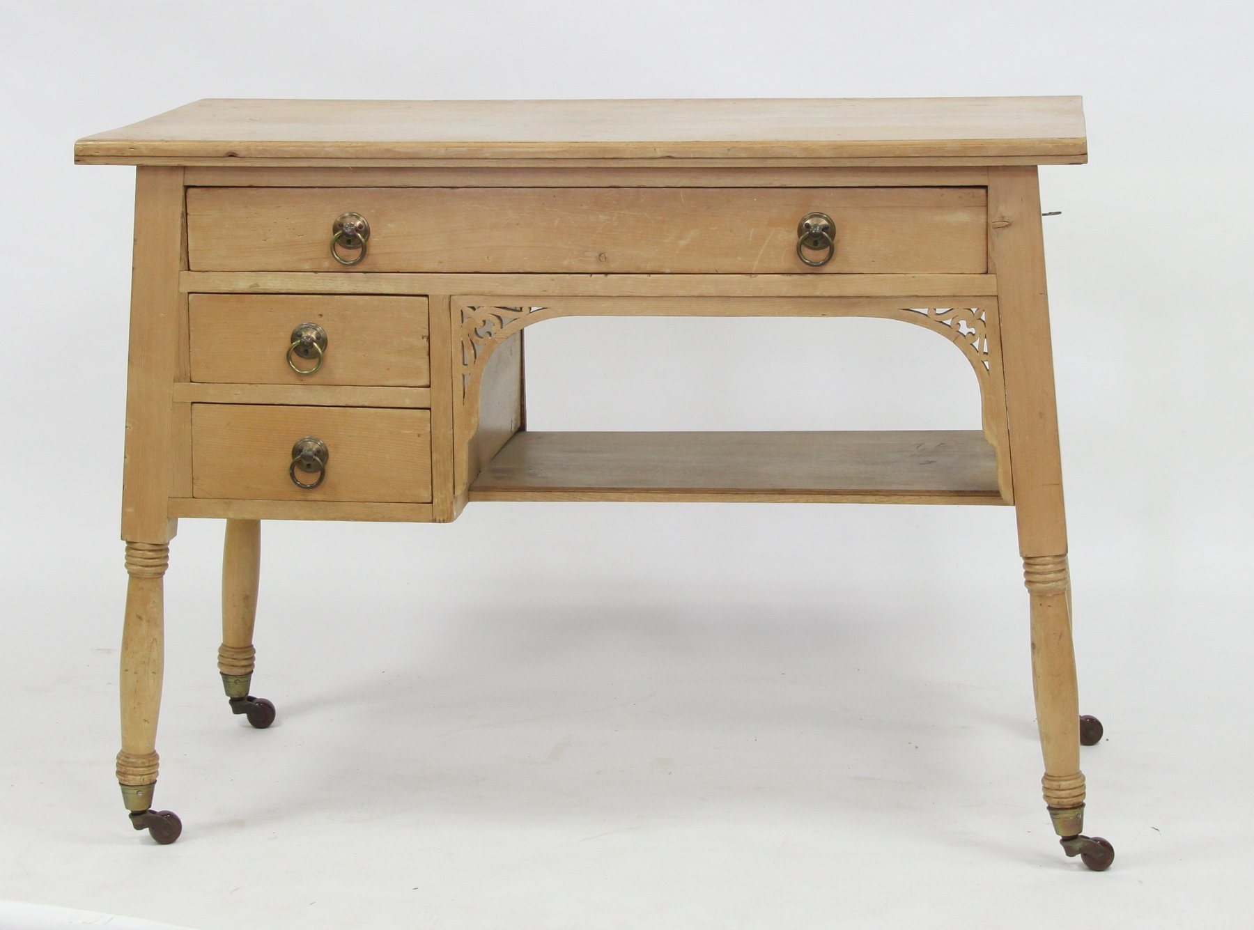 Appraisal: A pine desk fitted a long drawer above a kneehole