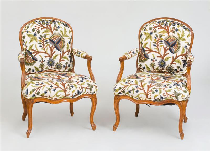 Appraisal: PAIR OF LOUIS XV STYLE BEECHWOOD FAUTEUILS LA REINE Upholstered