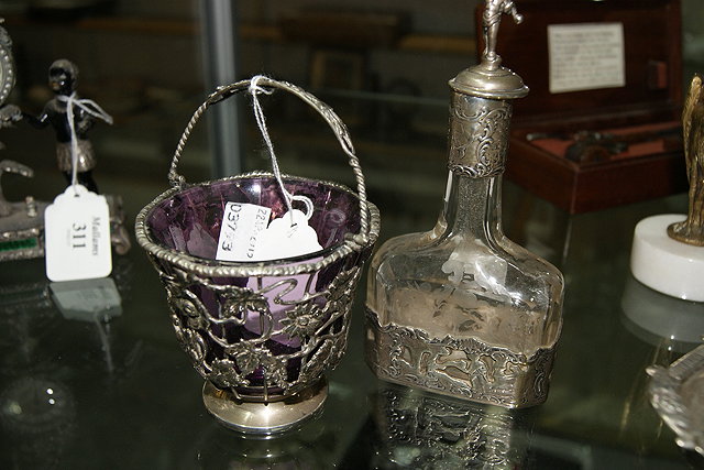 Appraisal: AN OPEN SILVER BASKET with loop handle pierced decoration and