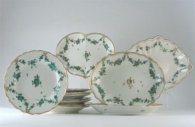 Appraisal: A Chelsea part dessert service painted with green swags hung