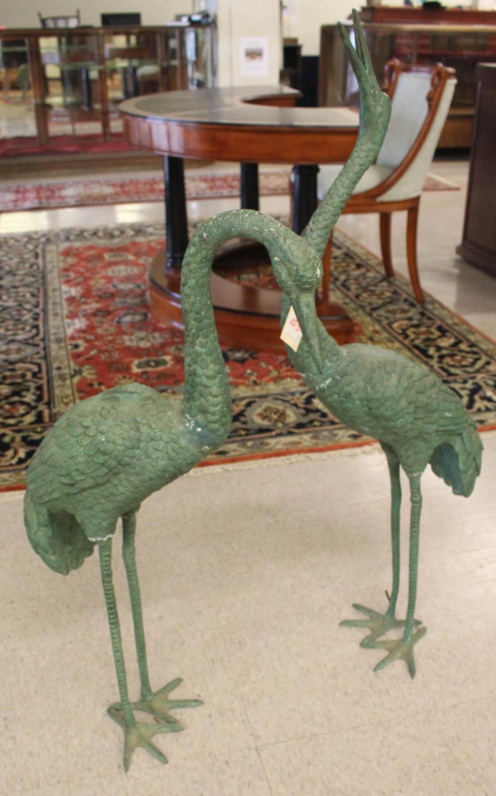 Appraisal: TWO VERDE BRONZE GARDEN CRANES Chinese th century in standing