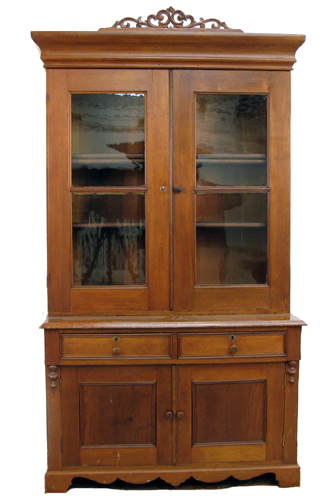 Appraisal: A VICTORIAN WALNUT CABINET BOOKCASE ON CUPBOARD American third quarter