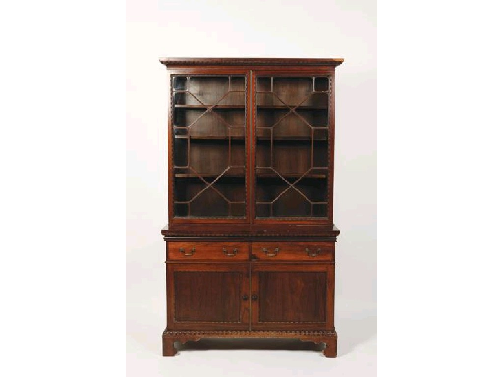 Appraisal: A REGENCY STYLE ROSEWOOD LIBRARY BOOKCASE with reel-mouldings throughout the