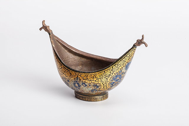 Appraisal: A PERSIAN PAPIER M CH TWO HANDLED BOWL with gilded