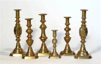 Appraisal: Six brass candlesticks england th century Including three pair Engraved