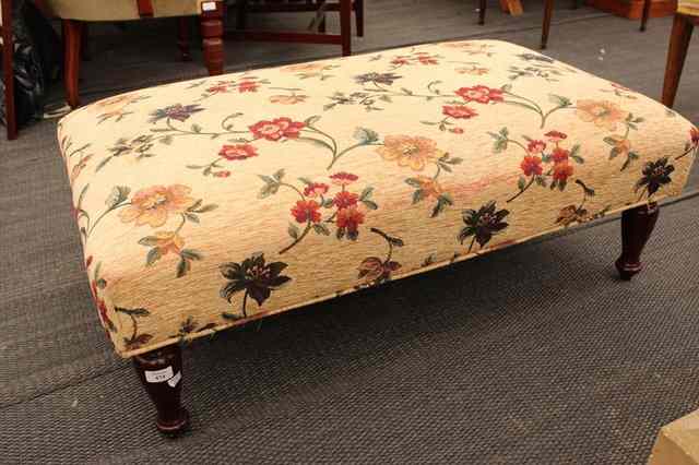 Appraisal: A MODERN RECTANGULAR FLORAL UPHOLSTERED STOOL standing on turned tapering