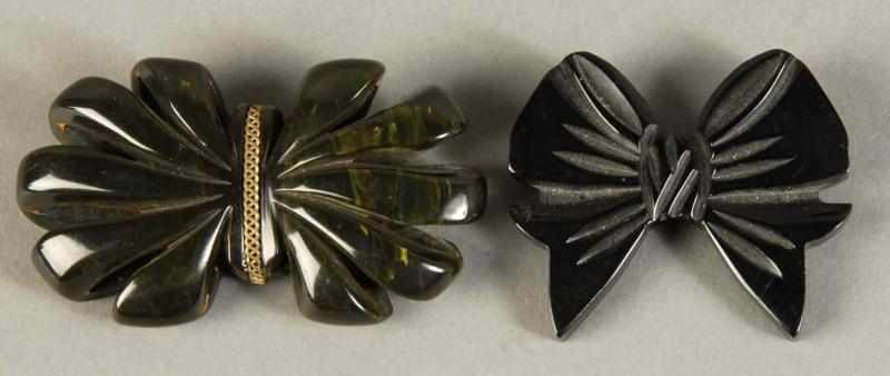 Appraisal: Lot of Bakelite Carved Black Bow Pins Description Includes one