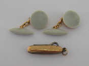 Appraisal: A pair of carat gold mounted enamel cuff links the