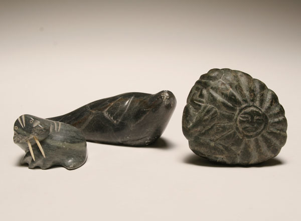 Appraisal: Three Alaskan Inuit carved stone figures seal walrus and effigy