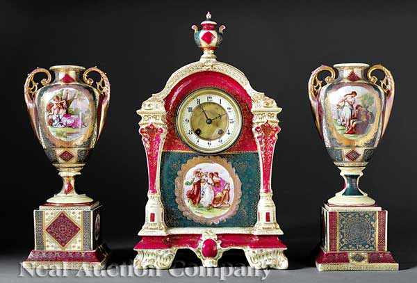 Appraisal: An Antique Austrian Porcelain Three-Piece Clock Garniture decorated with gilt