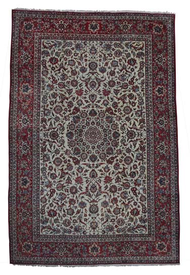 Appraisal: A large Isfahan carpet th century the cream field with